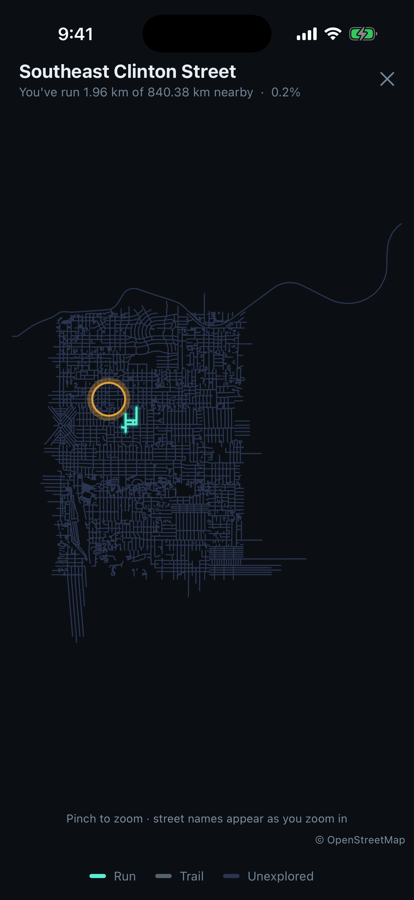 The coverage map for Southeast Clinton Street: a full street grid where the roads you have run are drawn in bright teal against the faint blue of streets you have not, with a gold ring marking your position. A header reads: you have run 1.96 km of 840.38 km nearby, 0.2 percent.